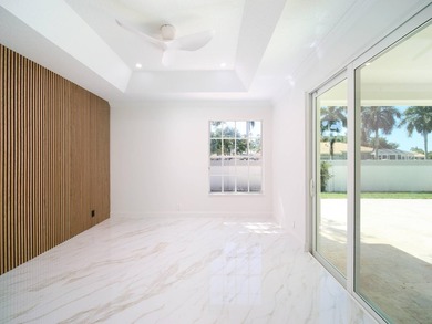 This completely reimagined 3-bedroom, 2-bath residence offers a - photo 20