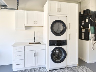 This completely reimagined 3-bedroom, 2-bath residence offers a - photo 24
