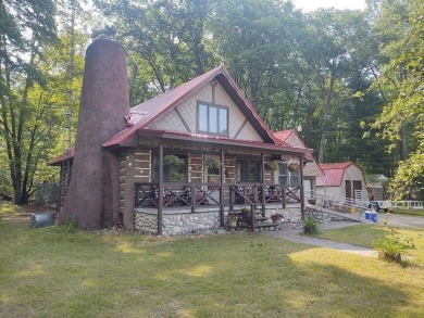 Lake Home ActiveUnderContr in Atlanta, Michigan