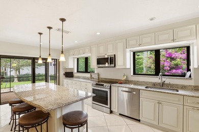 Rarely available in Estates of Silverlake! Situated on a private - photo 1