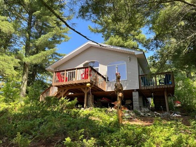 Escape to your own private slice of Rainy Lake paradise tucked - photo 15