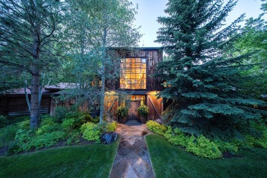 Set on 2.5 acres directly on the Bigwood River within a private - photo 5