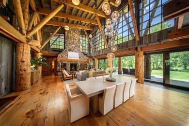 Set on 2.5 acres directly on the Bigwood River within a private - photo 8