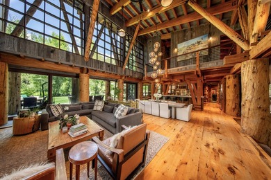 Set on 2.5 acres directly on the Bigwood River within a private - photo 9