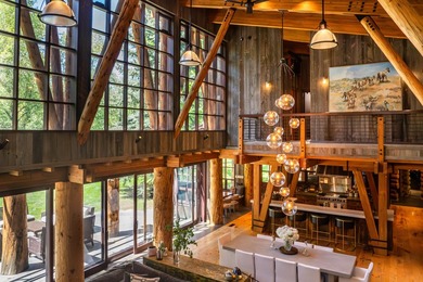 Set on 2.5 acres directly on the Bigwood River within a private - photo 10