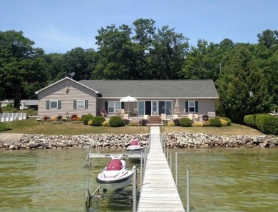 Lake Home For Sale in Topinabee, Michigan
