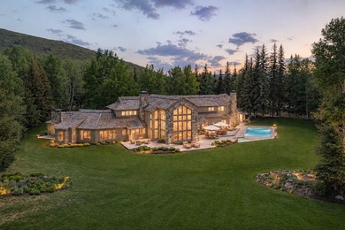 Set on 6.7 pristine acres along the Big Wood River and bordering - photo 1