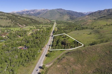 Set on 6.7 pristine acres along the Big Wood River and bordering - photo 2