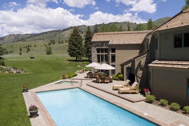 Set on 6.7 pristine acres along the Big Wood River and bordering - photo 5