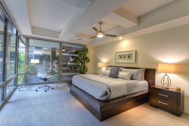 Gorgeous corner condo with extensive floor to ceiling glass and