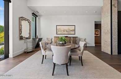 Located within a guard-gated enclave, this Paradise Valley