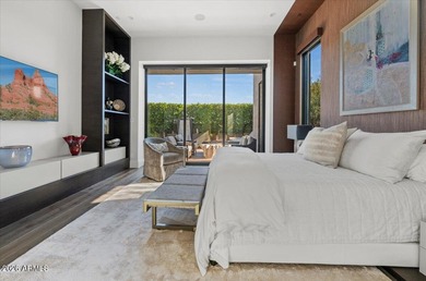 Located within a guard-gated enclave, this Paradise Valley