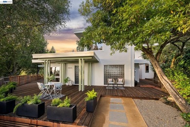 Hidden behind mature trees on a rare, level +/- half acre lot in - photo 5