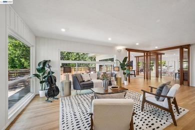 Hidden behind mature trees on a rare, level +/- half acre lot in - photo 8