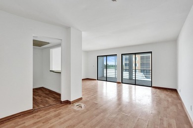 Ideally situated in the heart of North Palm Beach, this bright - photo 3