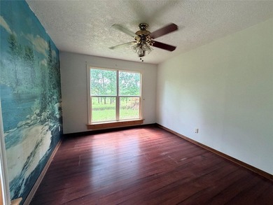 Tucked away on 7.6+ acres of unrestricted, lakefront land on - photo 19