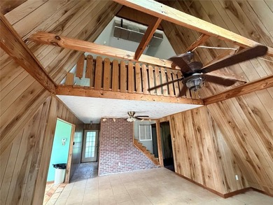 Tucked away on 7.6+ acres of unrestricted, lakefront land on - photo 23