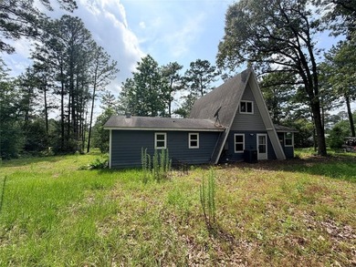 Tucked away on 7.6+ acres of unrestricted, lakefront land on - photo 31