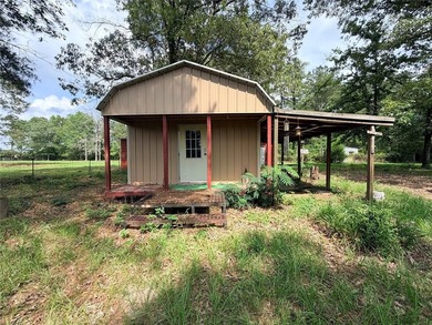 Tucked away on 7.6+ acres of unrestricted, lakefront land on - photo 35