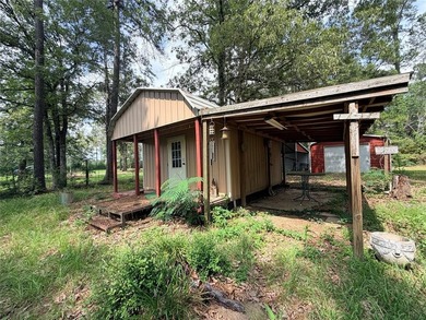 Tucked away on 7.6+ acres of unrestricted, lakefront land on - photo 36