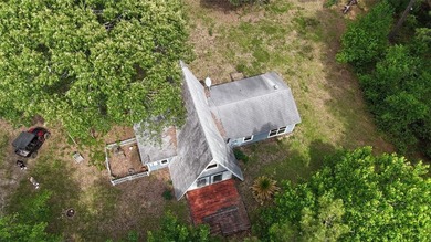 Tucked away on 7.6+ acres of unrestricted, lakefront land on - photo 47