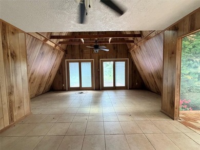 Tucked away on 7.6+ acres of unrestricted, lakefront land on - photo 49