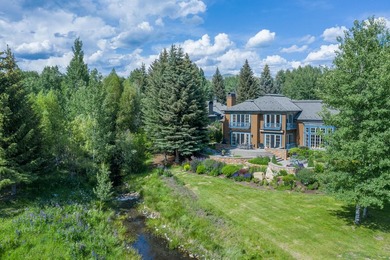 Set on over 5 acres of lushly landscaped grounds, the riverside - photo 1
