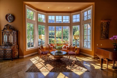 Set on over 5 acres of lushly landscaped grounds, the riverside - photo 9