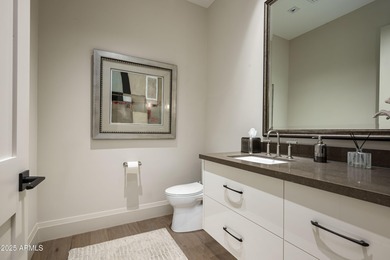 This luxury single story condominium is located in Icon at