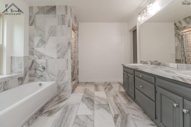 Spacious 3-bedroom, 2-bath home offering over 2,300 sq ft in a - photo 20
