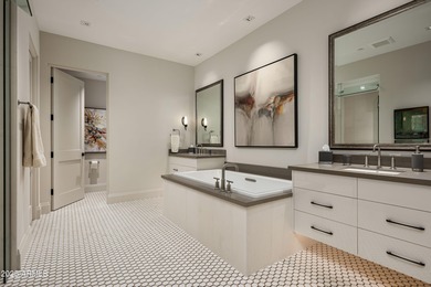 This luxury single story condominium is located in Icon at