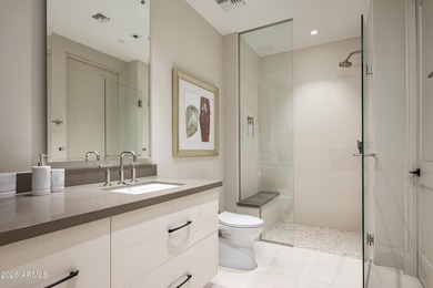 This luxury single story condominium is located in Icon at