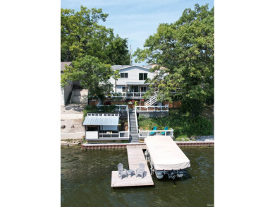 Experience the ultimate in lake home charm with this delightful - Lake Home Sale Pending in Monticello, Indiana