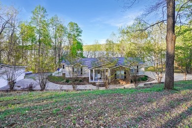 Escape to the tranquility of rural waterfront living! This - photo 3