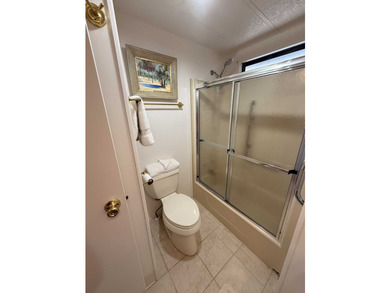 Updated 1985 A-Frame Home! Features a large carport with room - photo 3