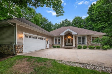 Impressive home with frontage on the 18th hole of St. Ives Golf - Lake Home For Sale in Stanwood, Michigan