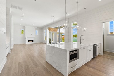 The Cove plan in the Powell Landing East neighborhood of - photo 17