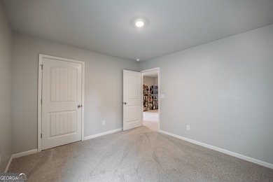 This 4-bedroom, 2.5-bath home sits on a desirable corner lot in - photo 19