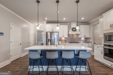 This 4-bedroom, 2.5-bath home sits on a desirable corner lot in - photo 32
