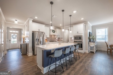 This 4-bedroom, 2.5-bath home sits on a desirable corner lot in - photo 33