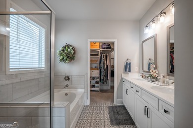 This 4-bedroom, 2.5-bath home sits on a desirable corner lot in - photo 45