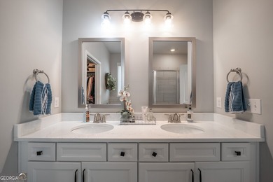 This 4-bedroom, 2.5-bath home sits on a desirable corner lot in - photo 47