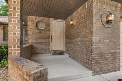Spacious brick home on a beautiful corner lot offering over half - photo 2