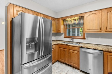 Spacious brick home on a beautiful corner lot offering over half - photo 9