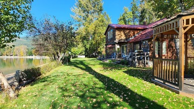 Gorgeous Swan Lake property with 202' frontage and dock located - photo 4