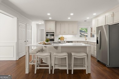 DO NOT MISS this Brick Beauty in coveted Hampton Woods with a - photo 11