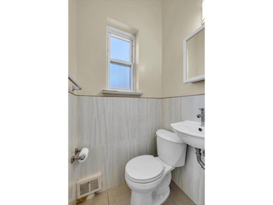 Welcome to this classic, all-brick semi-attached townhouse in - photo 11