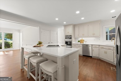 DO NOT MISS this Brick Beauty in coveted Hampton Woods with a - photo 12