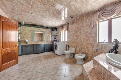 Welcome to your new home. This magnificent custom-built brick - photo 16