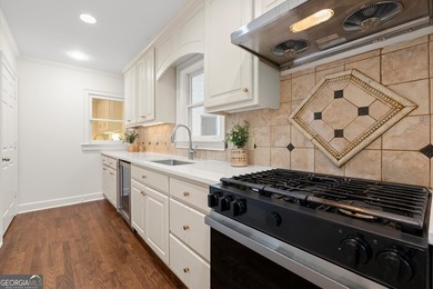 DO NOT MISS this Brick Beauty in coveted Hampton Woods with a - photo 20